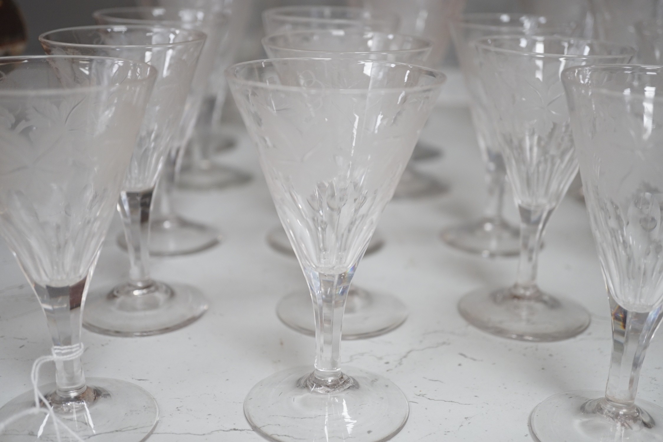 A part suite of Edwardian vineous etched glasses. Tallest 15cm